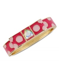 Polka dots provide a whimsical touch on this hinged bangle bracelet from Betsey Johnson. It's crafted from antique gold-tone mixed metal, and has a fuchsia bow with dots and a glass crystal accent. Item comes packaged in a signature Betsey Johnson Gift Box. Approximate diameter: 2-1/2 inches.