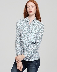 An enchanting floral print enlivens this fresh button-down Theory shirt, rendered in pure silk.