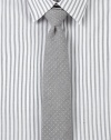 Slightly textured pindot tie adds finishing touches to any modern dress wardrobe.57% cotton/43% silkDry cleanMade in USA