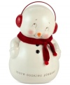 Too sweet, this irresistible snowman cookie jar is just begging for a fresh batch of Christmas cookies. With a red knit scarf, it's a festive treat from Department 56.