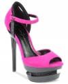 Fashion-forward style. Jessica Simpson's Casper platform sandals are brightly-colored with a unique contrasting platform.