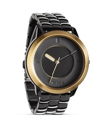 Favored for it's cool, sporty aesthetic, Nixon is the go to for watches with distinct style. This stainless steel and gunmetal piece is a prime example with a modernist design and performance level durability.