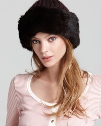 A cozy cap with a knit top and luxurious dyed rabbit fur trim from Surrell.