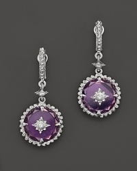 A delicate, feminine design in sterling silver with purple crystal and white sapphire accents.