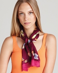 Butterflies, insects and flowers decorate this sheer oblong scarf for a whimsical touch.