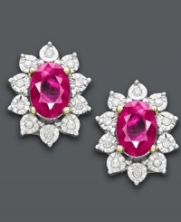 Add a pop of color. These regal and rich-looking stud earrings highlight oval-cut rubies (1-1/3 ct. t.w.) encircled by round-cut diamonds (5/8 ct. t.w.). Crafted in 10k gold. Approximate diameter: 3/8 inch.