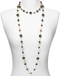 Embellished with delicate pearl and crystal stations, Carolee's illusion necklace sparkles with versatility -- elegant whether worn to dress up denim or enliven a classic white blouse.