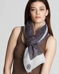 Go wild for this leopard printed scarf with a light blue contrast border.