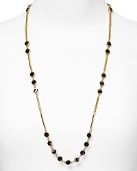 kate spade new york styles scattered simplicity with this long-link necklace, cast in 12 karat gold plate and accented by a smattering of bold stones.