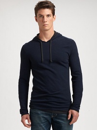 Fashion and functionality are intertwined in this double layered henley, finely crafted in soft, superior cotton for a timeless look.Attached drawstring hoodbullet text here CottonMachine washImported