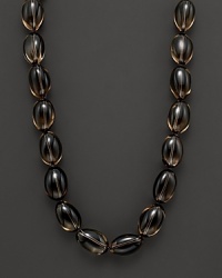 Smoky quartz beaded necklace with gold ball clasp.