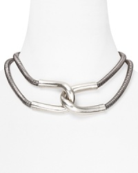 Giles & Brothers make chic work of the industrial-inspired jewelry trend with this silver oxide collar necklace. With polished links and a bold look, it encapsulates downtown cool.