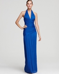 In a bright cobalt hue, Halston Heritage's micropleated gown stuns in a halter silhouette.