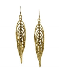 Shape up in style that makes an artistic statement. These chic drop earrings by BCBGeneration highlight multiple cut-out ovals in an overlapping pattern. Crafted in antique gold tone mixed metal. Approximate drop: 3 inches.