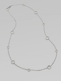 A long design punctuated with multiple sized circle links. Sterling silver Length, about 36 Lobster clasp closure Imported 