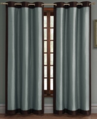 Boasting a two-toned shimmering design, the Peyton window panel offers a tailored look with its broad grommeted header and a touch of luxe dimension in its coordinating colors. Simple, yet sophisticated, this panel works well in any setting.