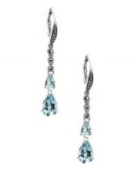 Take your special occasion style to a whole new level. Judith Jack's stunning drop earrings feature two pear-cut blue topaz (3-5/8 ct. t.w.) and glittering marcasite (1/5 ct. t.w.). Set in sterling silver. Approximate drop: 1-3/4 inches.