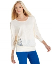 Lace insets at the sleeves and waist add a feminine touch to this simple, chic top from Style&co.