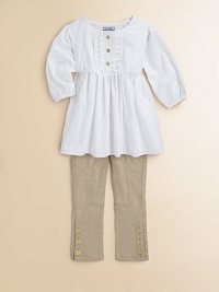 Sweet and simple, this woven cotton top has graceful chain-pattern embroidered stripes and soft ruffles at the placket.Round necklineButton placket with rufflesGathered empire waistGently gathered shouldersThree-quarter sleeves with elasticized cuffsCottonMachine washImported