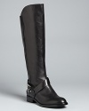 Sigerson Morrison gives her riding boots signature downtown edge with sleekly polished ankle buckles. They're sophisticated enough for work, stylish enough for everyday.