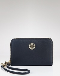 Stylish functionality, a leather Tory Burch wristlet is designed with the iPhone in mind, trimmed by an understated logo medallion.