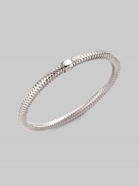 From the Primavera Collection. A basketwoven design in 18K white gold with a single bead accent.18K white gold Diameter, about 65mm, (2.56) Made in Italy