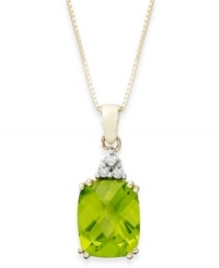 Take your look to the next level with the right amount of color. A rectangular-cut peridot (3-1/4 ct. t.w.) and a crown of diamond accents adds sparkle to this shining 14k gold necklace. Approximate length: 18 inches. Approximate drop: 3/4 inch.