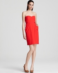 Impeccably structured in a striking silhouette (and hue), this BCBGMAXAZRIA strapless dress touts casually cool side pockets for seriously modern edge.