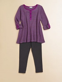 The perfect outfit for all her play dates, with a cute and comfy ribbed tunic and matching leggings. Shirt CrewneckButton frontThree-quarter sleeves with rolled tab cuffsA-line Leggings Pull-on style50% polyester/25% pima cotton/25% micromodalMachine washImported Please note: Number of buttons may vary depending on size ordered. 