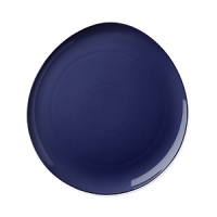 This fashion-forward porcelain dinnerware has signature DVF style - bold, unique, modern. The highly glossed surface, intentionally irregular curves and exposed seams create a chic tablescape and offer infinite styling possibilities. Mix and match with other colors in the Pebblestone collection to create your own signature look.