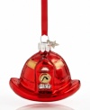 Celebrate everyday heroes with the fireman's hat ornament, featuring blazing-red glass embellished with gold glitter and a star-shaped charm. From Midwest.