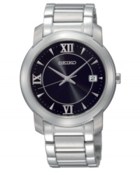 Broad links, stainless steel and simple black bring refinement to this Seiko timepiece. Watch features stainless steel bracelet and round case. Black dial with logo, silvertone hands, triangular indices, Roman numerals at twelve, six and nine o'clock and date window. Analog quartz movement. Water resistant to 30 meters. Three-year limited warranty.