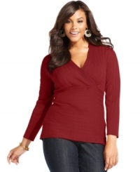 Dress up your casual look with Style&co.'s long sleeve plus size sweater, finished by a surplice neckline.