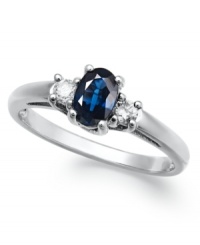 A subtle touch of blue. This vibrant 14k white gold ring features an oval-cut sapphire (1/2 ct. t.w.) and round-cut diamond side stones (1/8 ct. t.w.).