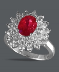 Royally stunning. Effy Collection's vibrant ring features an oval-cut ruby (1-9/10 ct. t.w.) surrounded by round-cut diamonds (1 ct. t.w.) and set in 14k white gold. Approximate diameter: 3/4 inch.