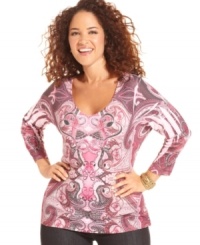 Be fashionable and charitable with One World's three-quarter-sleeve plus size top-- for every garment sold, $1 will be donated to the Susan G. Komen Foundation.