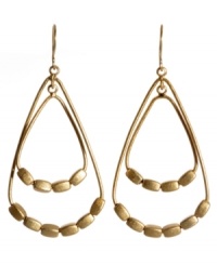 Cutting edge style by Kenneth Cole New York. Goldtone drop earrings in mixed metal. Approximate drop: 1-3/4 inches.