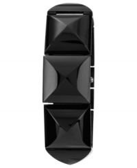 Go undercover with this pyramid-stud watch from Vince Camuto. Features a bangle bracelet-inspired design with a covered dial.