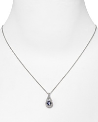 Hand cut and perfectly faceted cubic zirconia and sapphire stones dress up this delicate sterling silver-finished pendant necklace from Crislu.