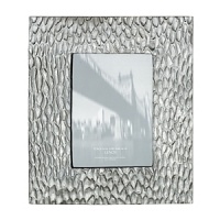 Donna Karan infuses her modern, city-chic aesthetic into this uniquely textured frame from Lenox.