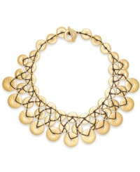 Go for the gold. Crafted in gold tone mixed metal, Lauren Ralph Lauren's chic collar necklace is embellished with hammered disks. Includes a toggle closure. Approximate length: 16 inches.