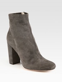 On-trend ankle boot rendered in fine suede with an easy side zip. Self-covered heel, 4 (100mm)Suede upperSide zipperLeather lining and solePadded insoleImported