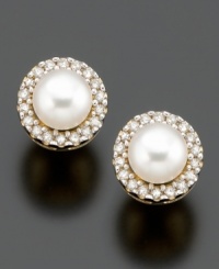 A simply glamorous addition to any look. 14k gold earrings featuring cultured freshwater pearl (4 mm) and diamond accents.