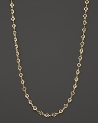 Faceted white sapphires glittering 18K yellow gold. A Temple St. Clair signature charm adorns the clasp.