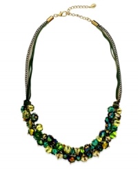 This c.A.K.e. by Ali Khan necklace features multi-colored glass bead clusters (10-12 mm) with a brown suede and gold tone mixed metal setting. Approximate length: 18 inches + 3-inch extender.