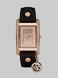 A glamorous, chic design with a chocolate brown leather strap and sparkling Swarovski crystals.Quartz movement Water resistant to 5 ATM Rose goldplated stainless steel rectangular case, 32mm x 36mm, (1.25 x 1.02) Swarovski crystals along side case Light rose gold dial Arabic numeral and index hour markers Second hand Swarovski crystal logo charm Leather strap Buckle closure Imported 