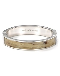 Add exotic edge to your accessory collection with MICHAEL Michael Kors' horn bangle. Whether you're downtown or on safari, this earth-toned bracelet loves bright separates and a wild itinerary.