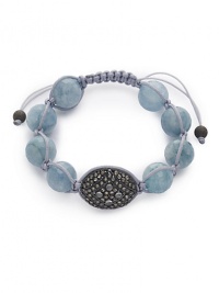 THE LOOKLuxury CollectionFaceted aquamarine beadsMoonstone accents1.8 tcw diamond-studded detailRhodium-plated sterling silver beadCord setting with adjustable closureTHE MEASUREMENTAdjustable diameter, about 2-3ORIGINMade in USA