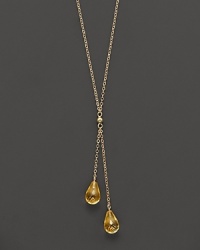 Twin citrine briolettes sparkle from this 14K yellow gold lariat necklace.