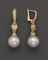 Freshwater pearl drop earrings with heart-shaped canary crystal and pave diamond accents. By Judith Ripka.